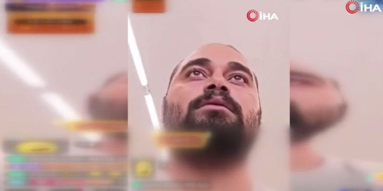 Daha fazla izlenme kazanmak için kasiyere saldırdı