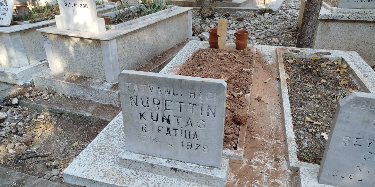 Açılan mezarda iki kişinin daha kemikleri bulundu