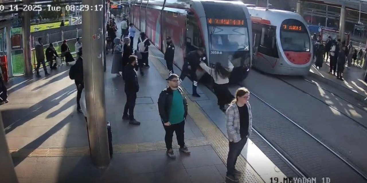 Güvenlik görevlisi genç kızı ezilmekten kurtardı!
